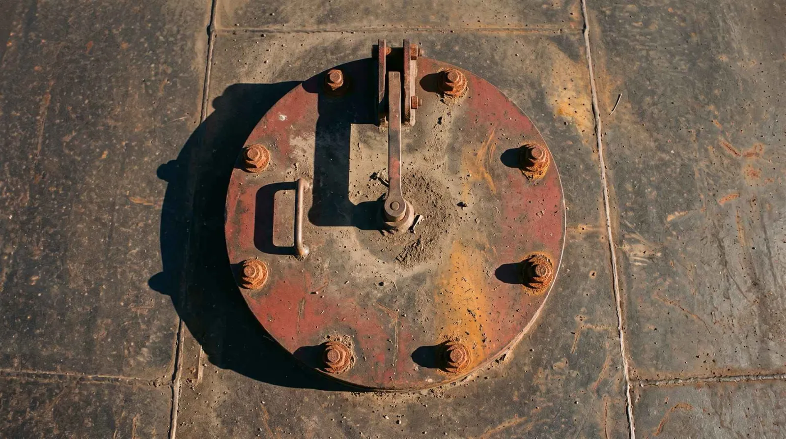A closed and bolted silo roof hatch, the access point crews open to look inside for a manual level check