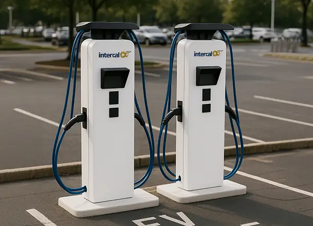 Modern electric vehicle charging stations in commercial parking lot showcasing energy and electrification infrastructure for sustainable transportation