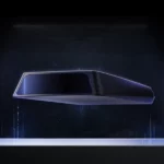 Hesai AT360 automotive-grade LiDAR sensor with sleek aerodynamic design shown in dark blue lighting against black background