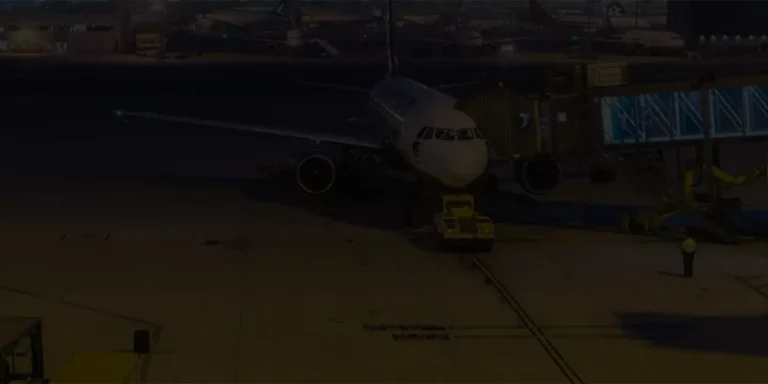 Commercial aircraft connected to Intercal8 electrified ground power system at airport gate for sustainable aviation operations